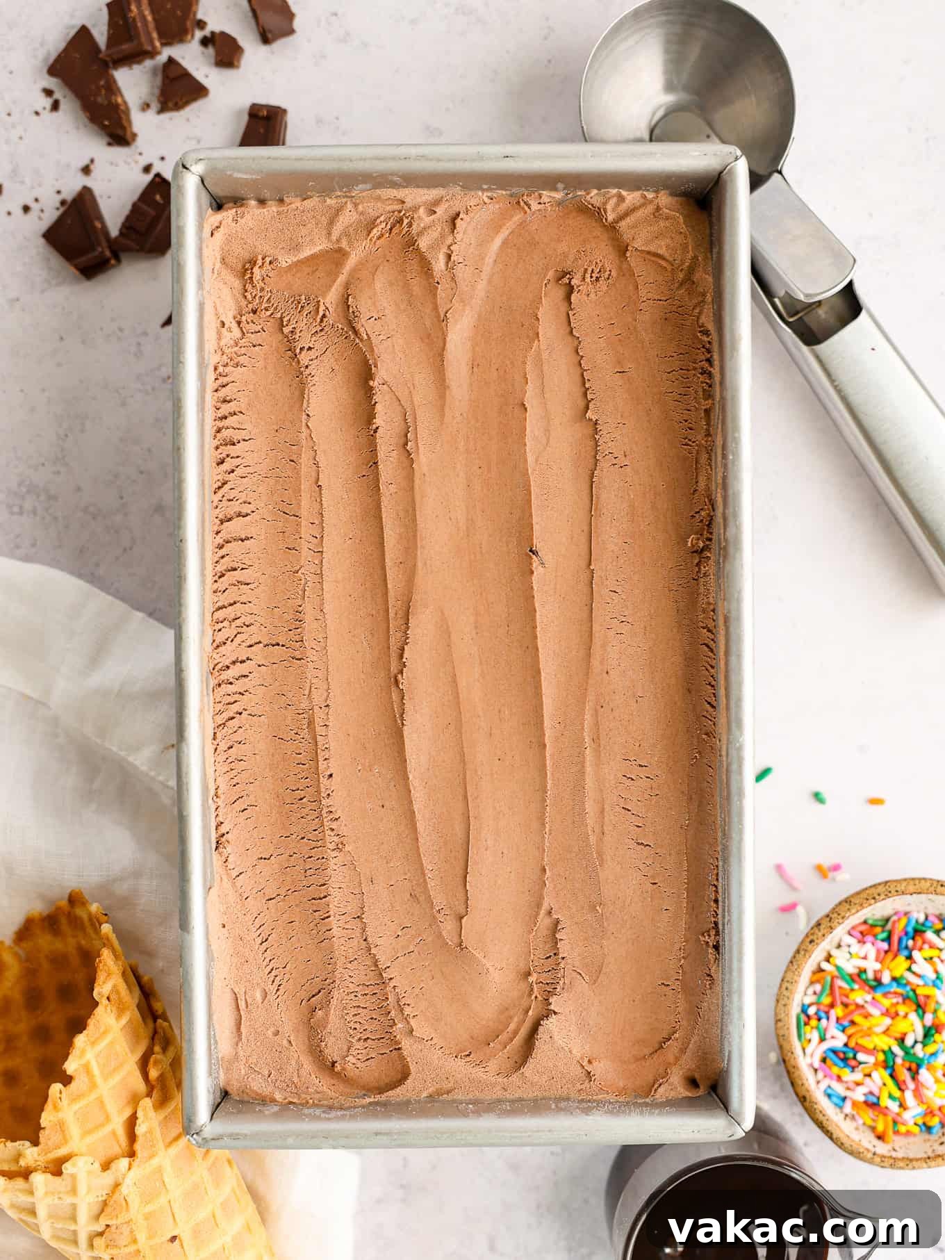 Decadent Chocolate Bliss 8 An overhead view of rich homemade chocolate ice cream set in a loaf pan, ready to be scooped.