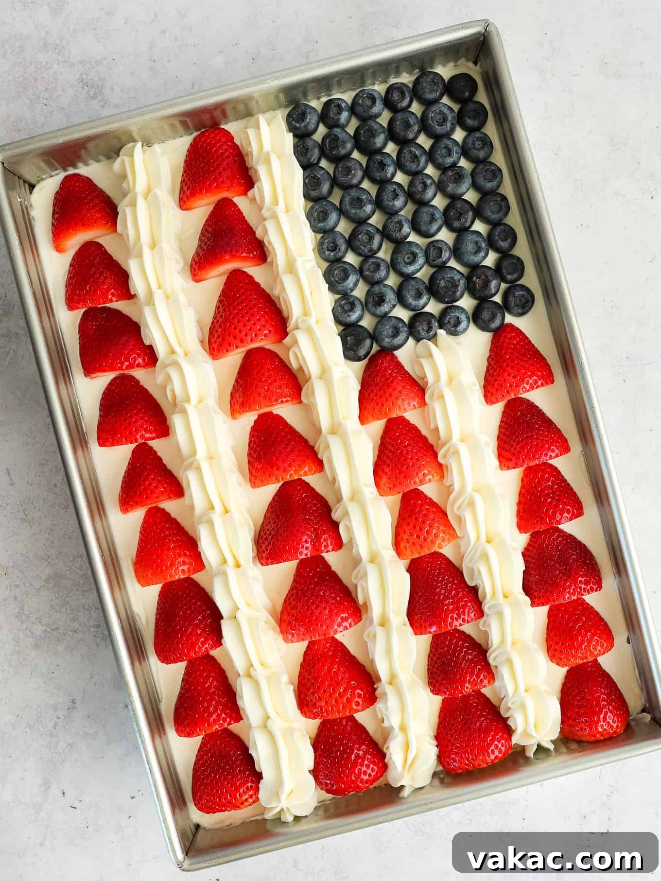 Patriotic Celebration Cake 6 A flag cake decorated with strawberries and blueberries.