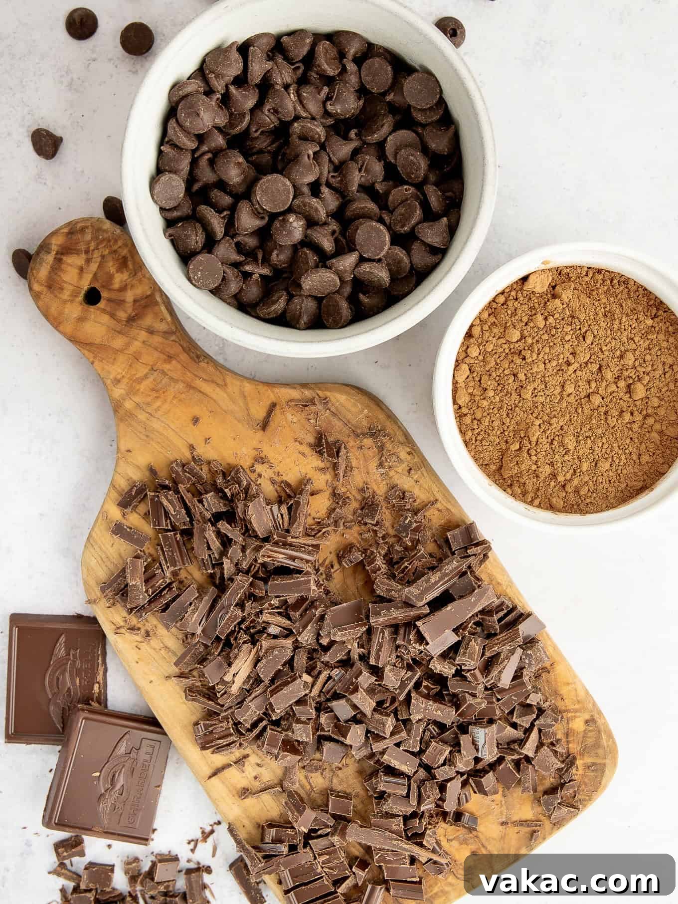 Caramelized Butter Brownie Bliss 3 An overhead view of premium chocolate chips, rich cocoa powder, and finely chopped chocolate bars, essential ingredients for superior brownies.