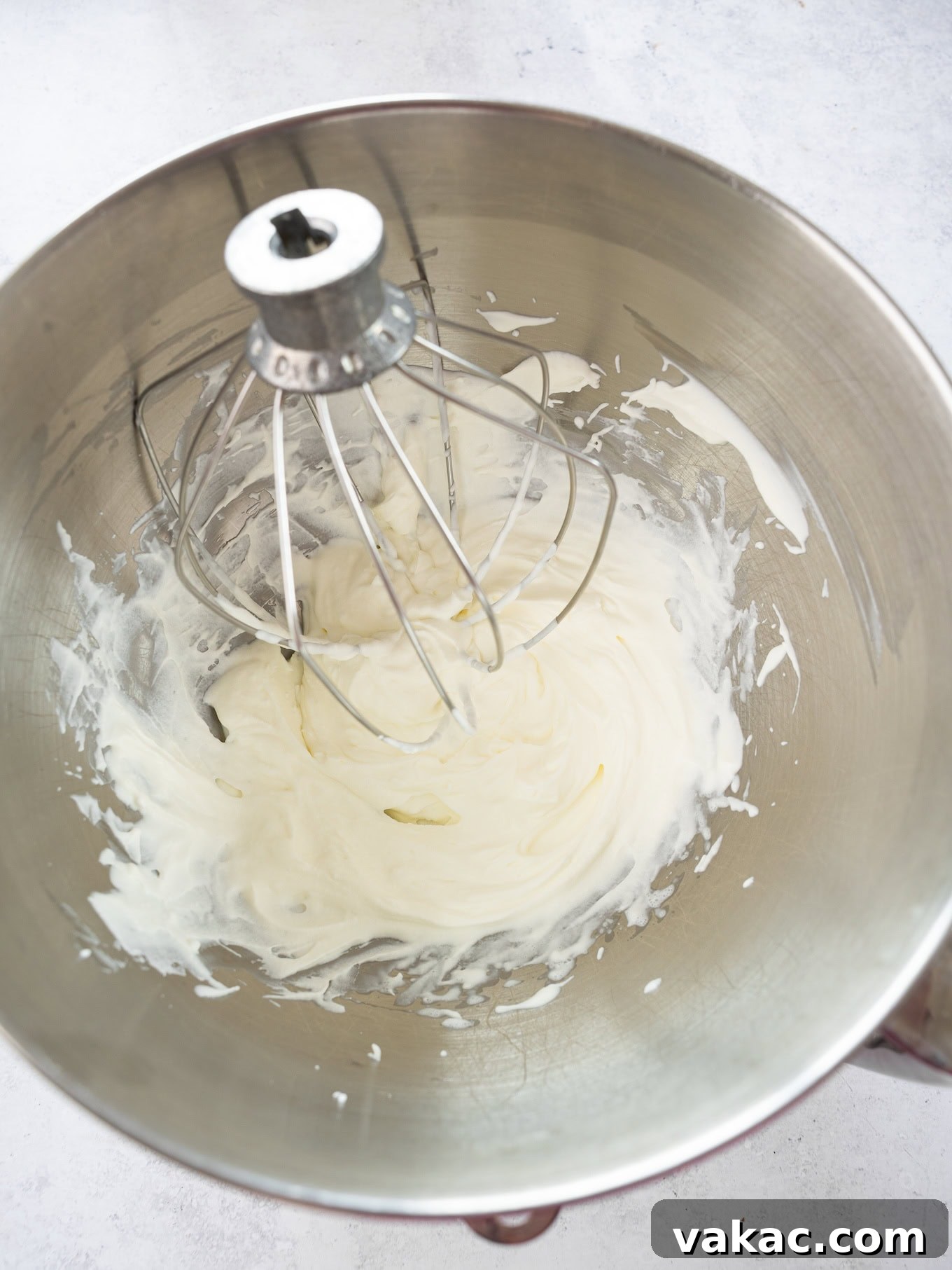 Sunshine Key Lime Bliss 6 An overhead view of whipped cream in a mixing bowl.