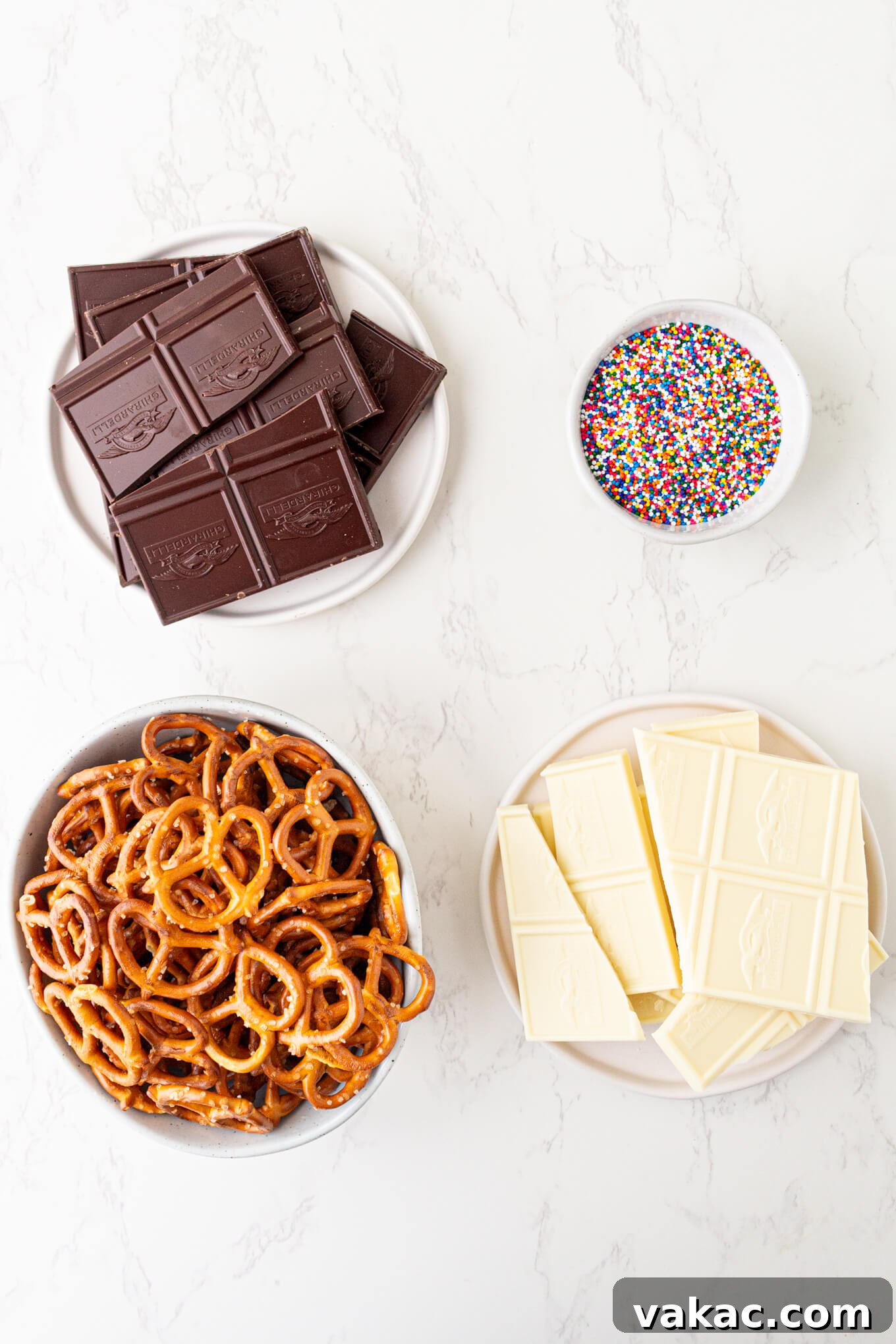 Twisted Chocolate Indulgence 3 An overhead view of the ingredients for making chocolate covered pretzels, including pretzels and chocolate bars.