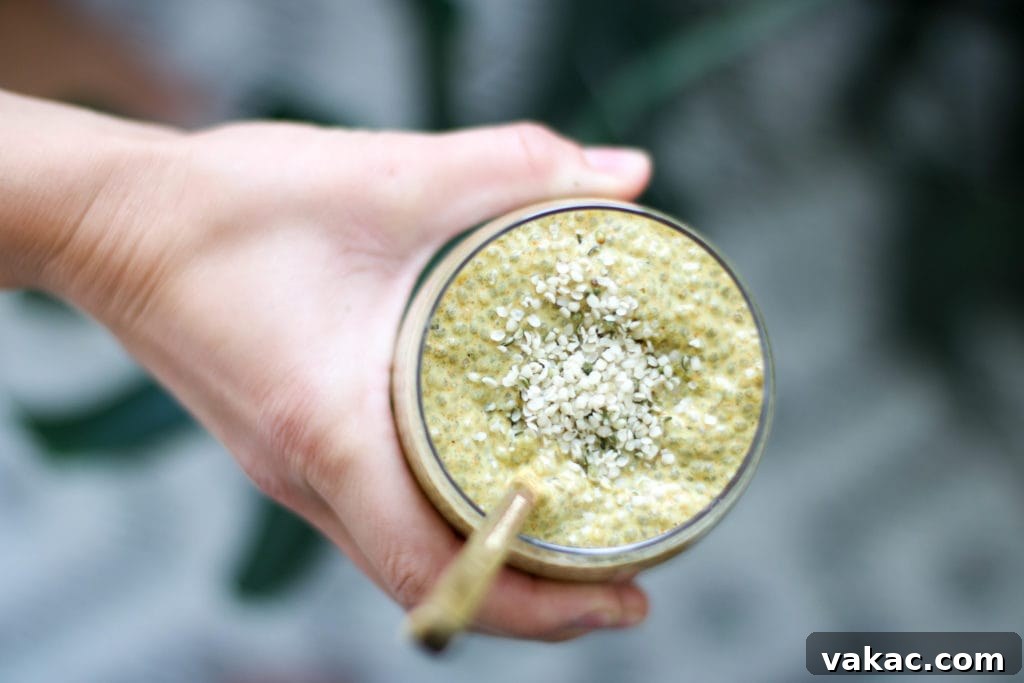 Plant Based Protein Powerhouses for Optimal Health 5 A bowl of fresh fruit, nuts, and hemp hearts, illustrating a healthy breakfast or snack option rich in plant-based nutrients.