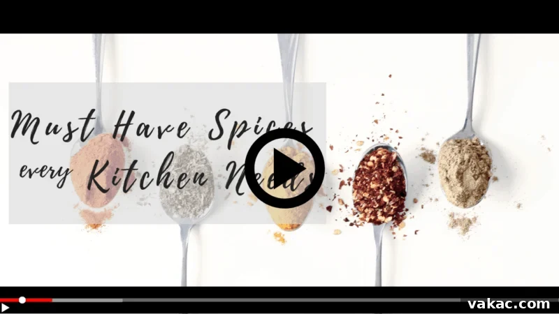 10 Essential Spices to Elevate Your Everyday Cooking 2 A vibrant selection of various spices arranged artfully on a wooden surface, showcasing their diverse colors and textures. From red paprika to yellow turmeric and green herbs, the image highlights the richness of culinary flavors.