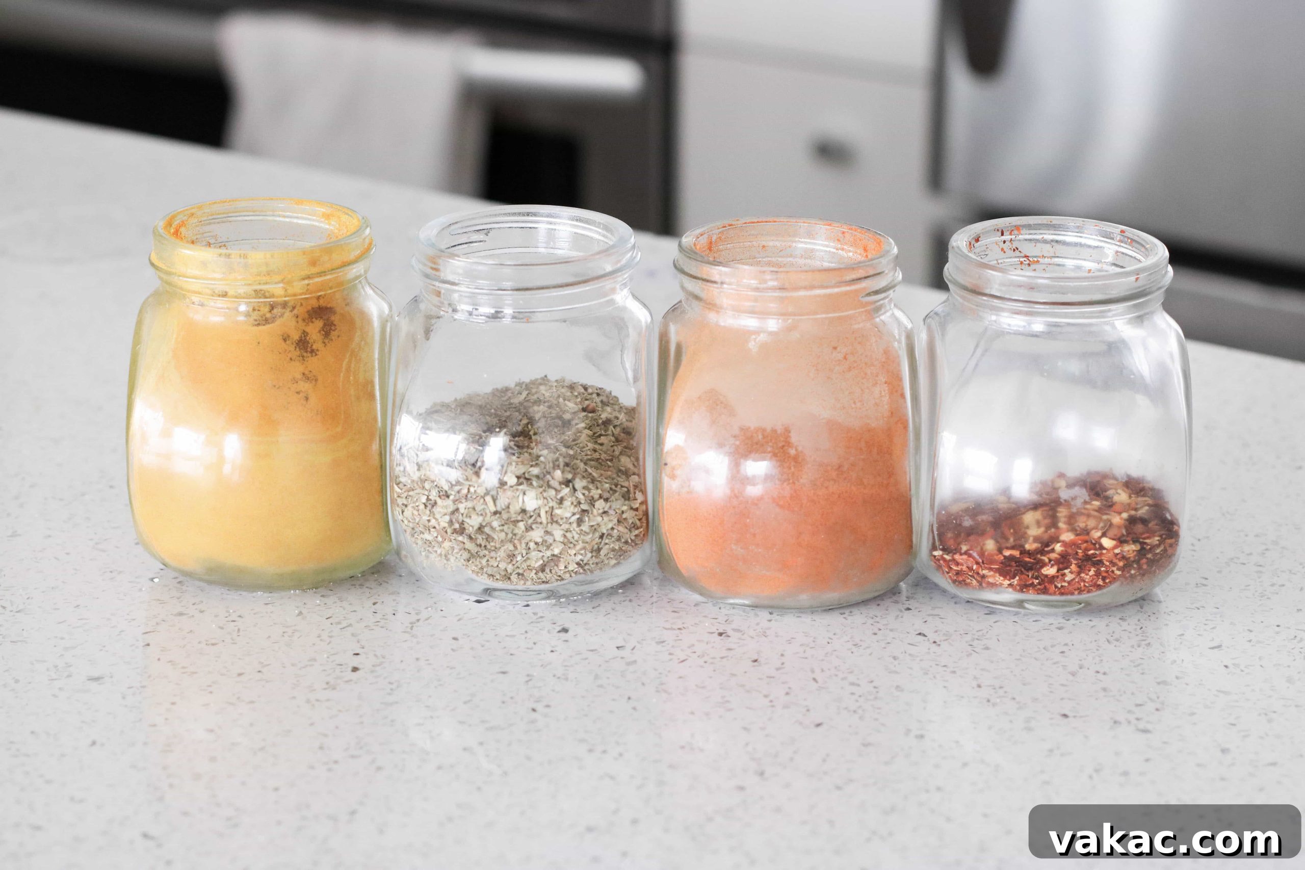 Kitchen Cornerstones 3 Variety of spices and whole grains neatly arranged in a kitchen pantry, highlighting cooking essentials.