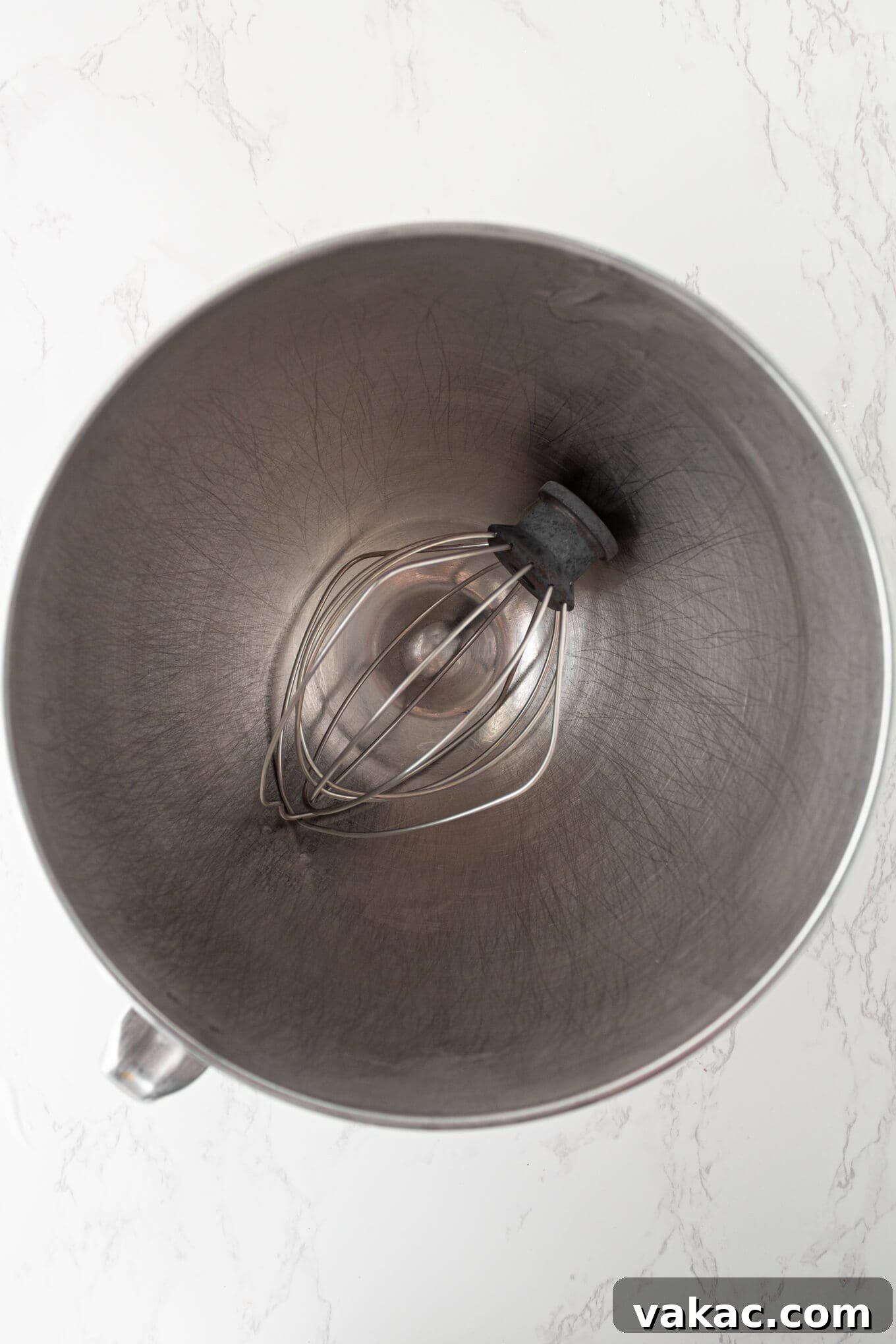 Strawberry Cloud Perfection 3 A metal mixing bowl and whisk attachment, ready for whipping cream.