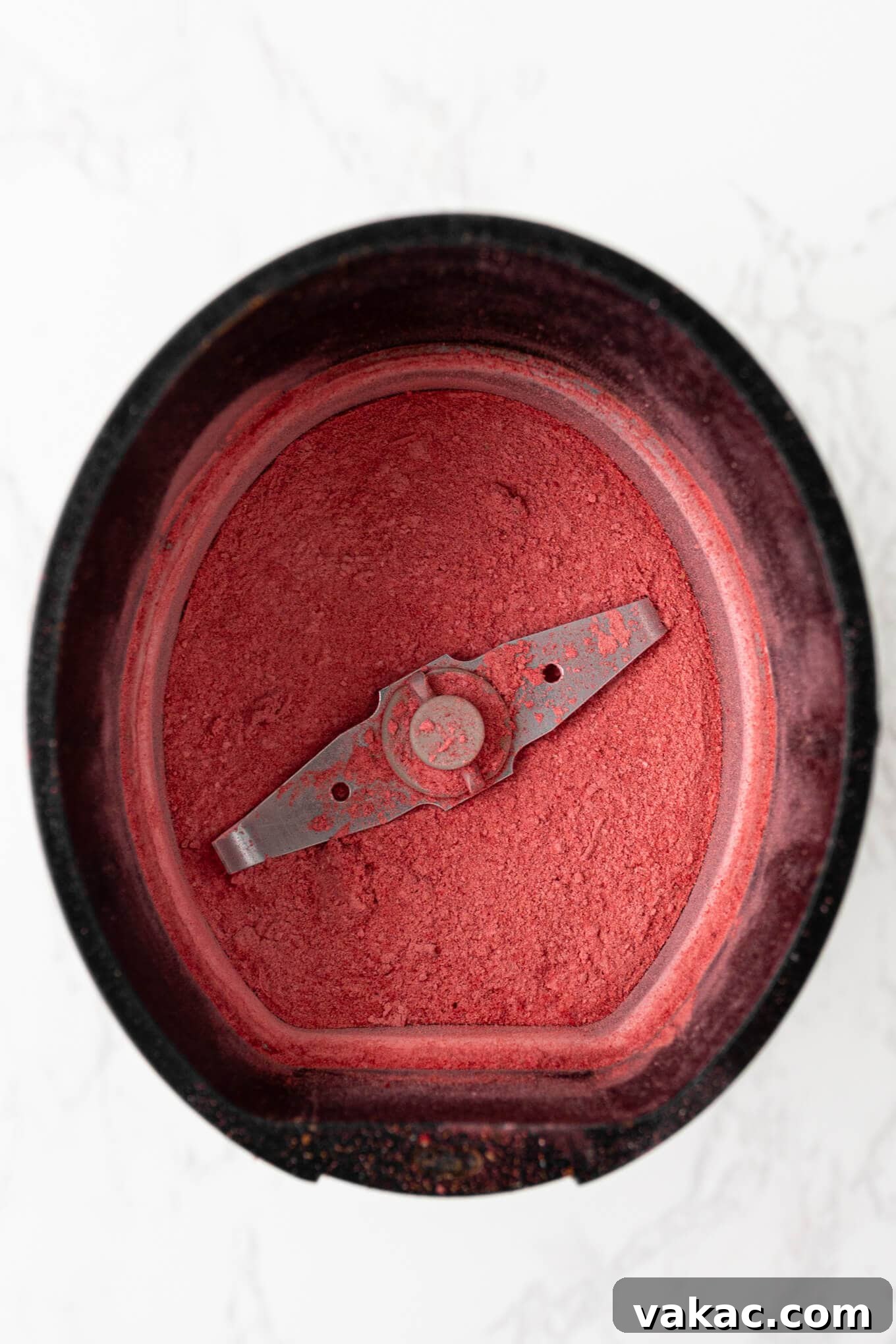 Strawberry Cloud Perfection 4 Freeze-dried strawberry powder in a food processor, illustrating the finely ground texture.