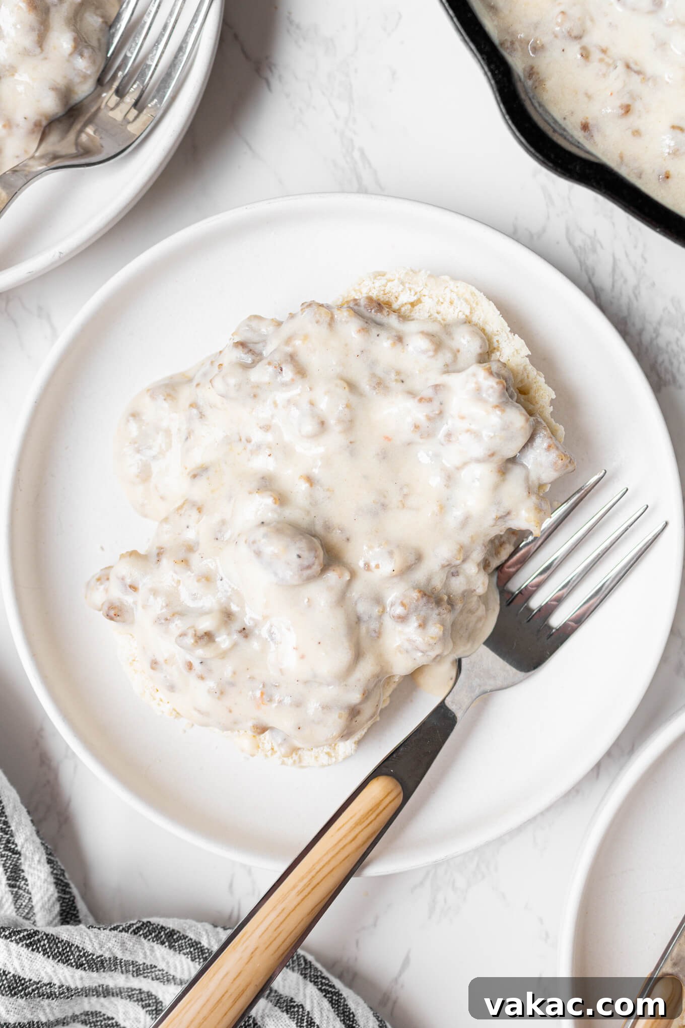 Southern Sausage Gravy Recipe for Biscuits and Breakfast 2 Overhead view of biscuits and sausage gravy.