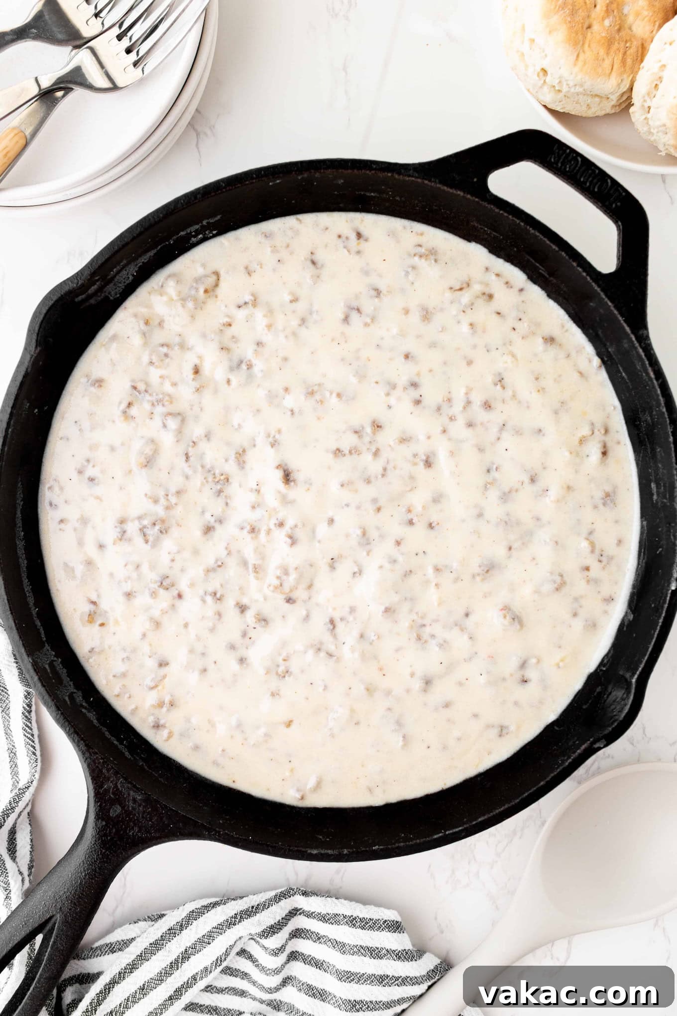 Southern Sausage Gravy Recipe for Biscuits and Breakfast 7 Overhead view of sausage gravy in a skillet.