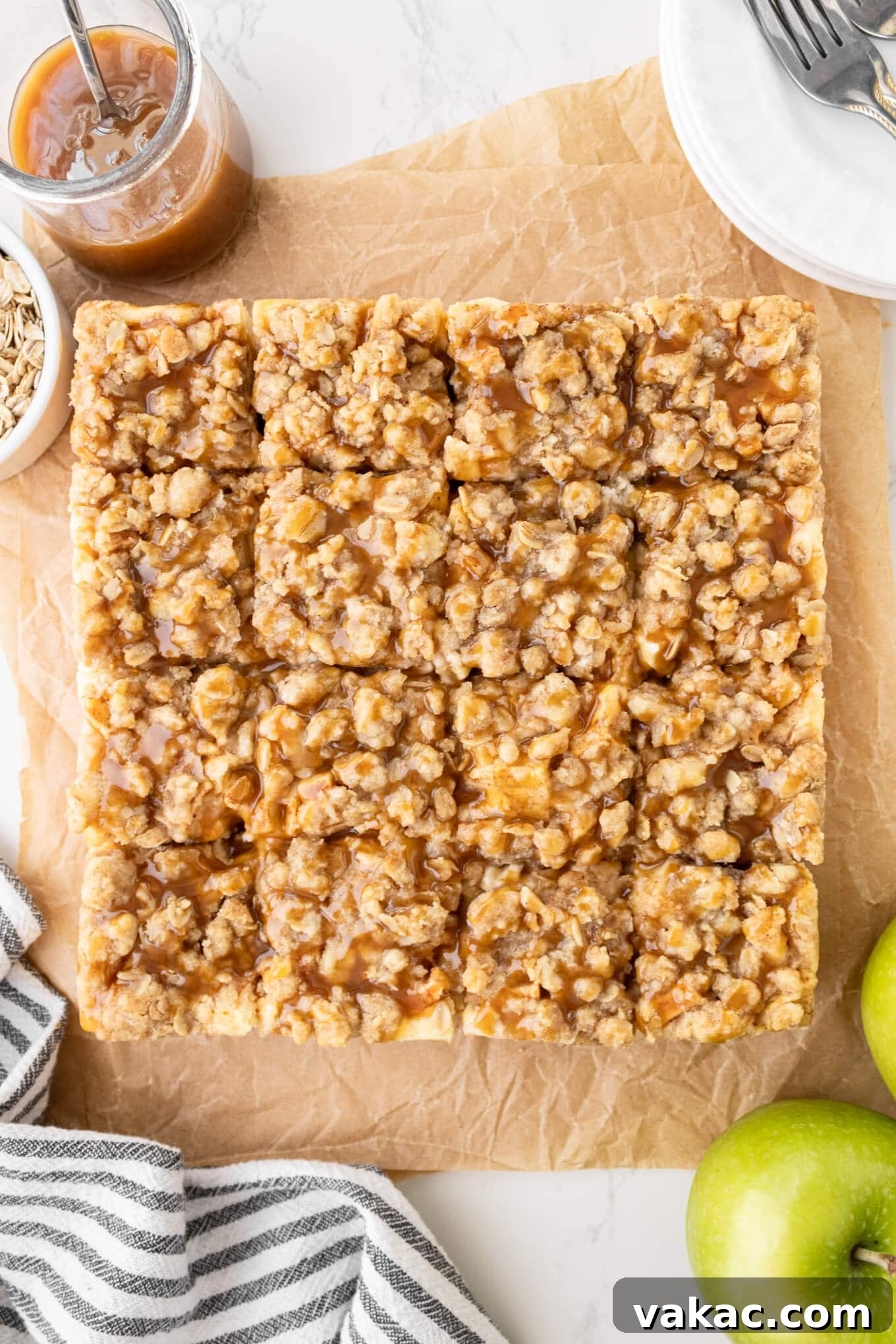 Caramel Apple Cheesecake Bars with Cinnamon Crust 8 An overhead view of caramel apple cheesecake bars.